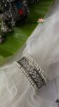 🌸 Floral Heritage: Broad Pearl-Studded Hand Cuff ⚪